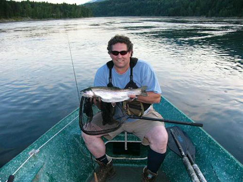 Rod Z with another lovely fish from guided fly fishing in the river